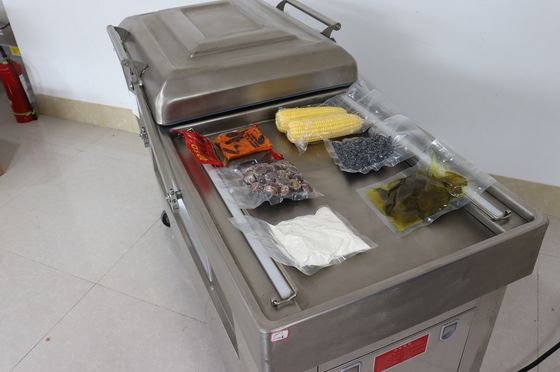Elektrisch angetriebene Doppelkammer Vakuumverpackungsmaschine für Gemüse, Brot, Fisch und Meeresfrüchte 120 kg