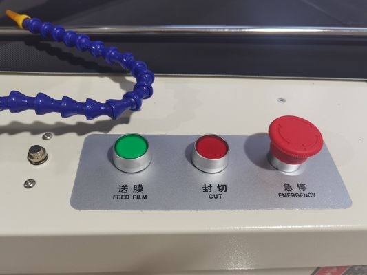 Automatische Maschine zum Versiegeln und Schneiden von Kartonfolie mit Handschellen