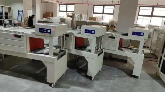 Herstellungsbetrieb Heat Tunnel Sealer Wrapper Automatische Schrumpf Hülle Wickelmaschine