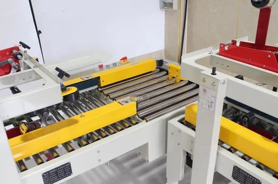 FXJ-4030S Halbautomatische Kreuzversiegelung Kartonkastenkasten Versiegelungsband Versiegelungsmaschine mit beiden Enden Rolltisch
