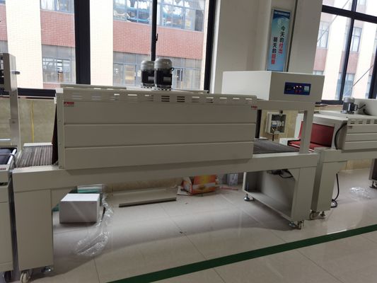Elektrisch angetriebene halbautomatische Wasserflaschen-Schrumpfverpackungsmaschine für Trays und Kisten