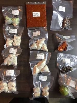 Vakuumverpackungsmaschine für Hühner mit elektrischem Antrieb und 400 mm Dichtungslänge